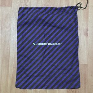 Modern Amusement Purple and Black Striped Bag